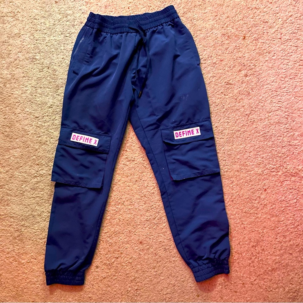 Define-X adjustable track pants with zipper down the sides